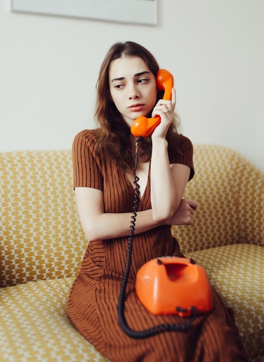 vintage girl with old phone